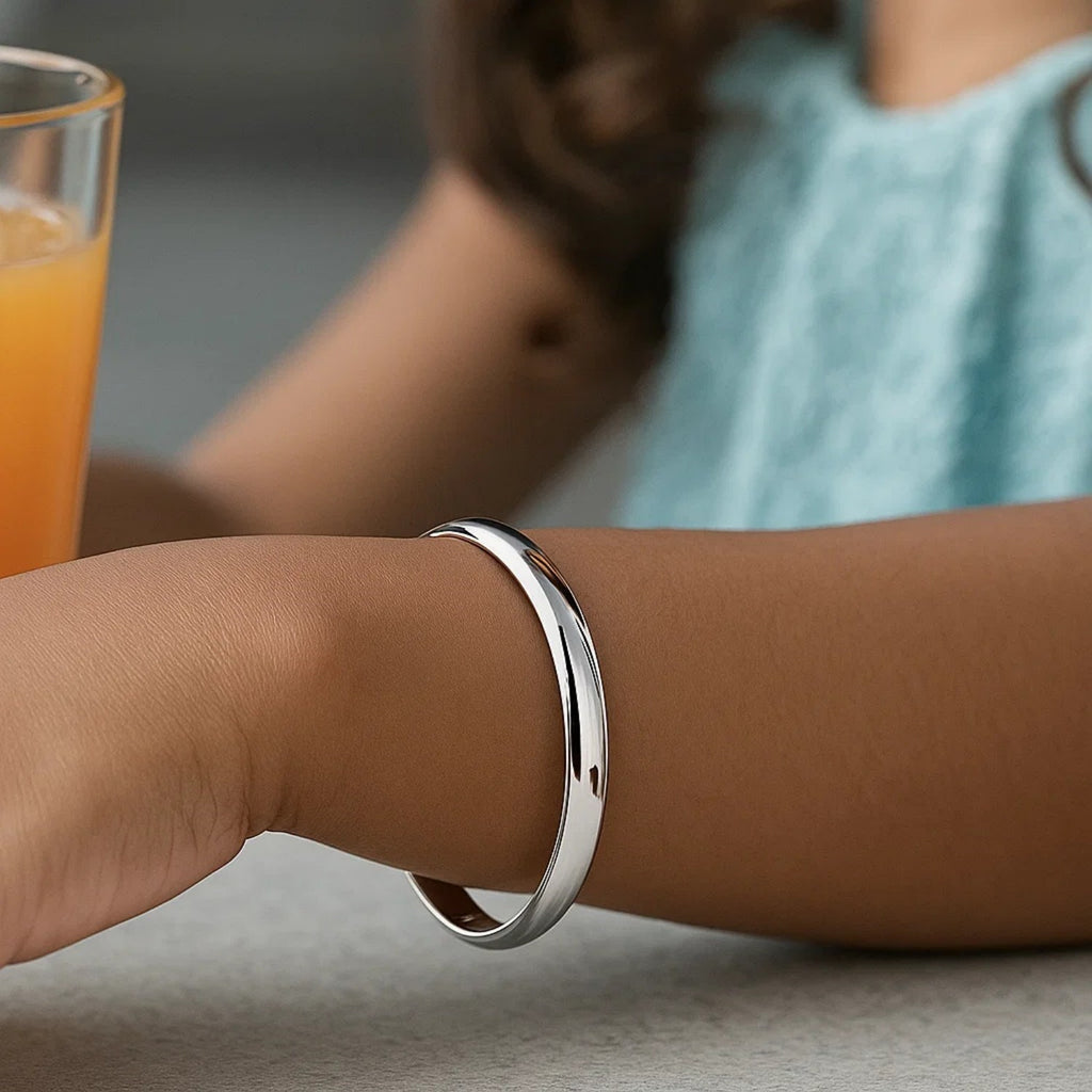 14k White Gold Dome Childrens Bangle with a Polished Finish (5.50 mm)