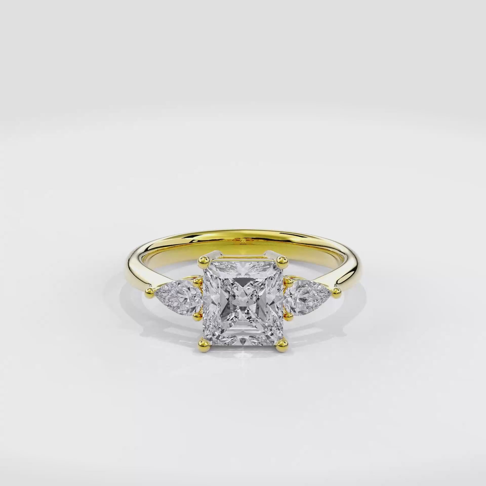 Daphnis Three Stones Engagement Ring Radiant•Yellow Gold