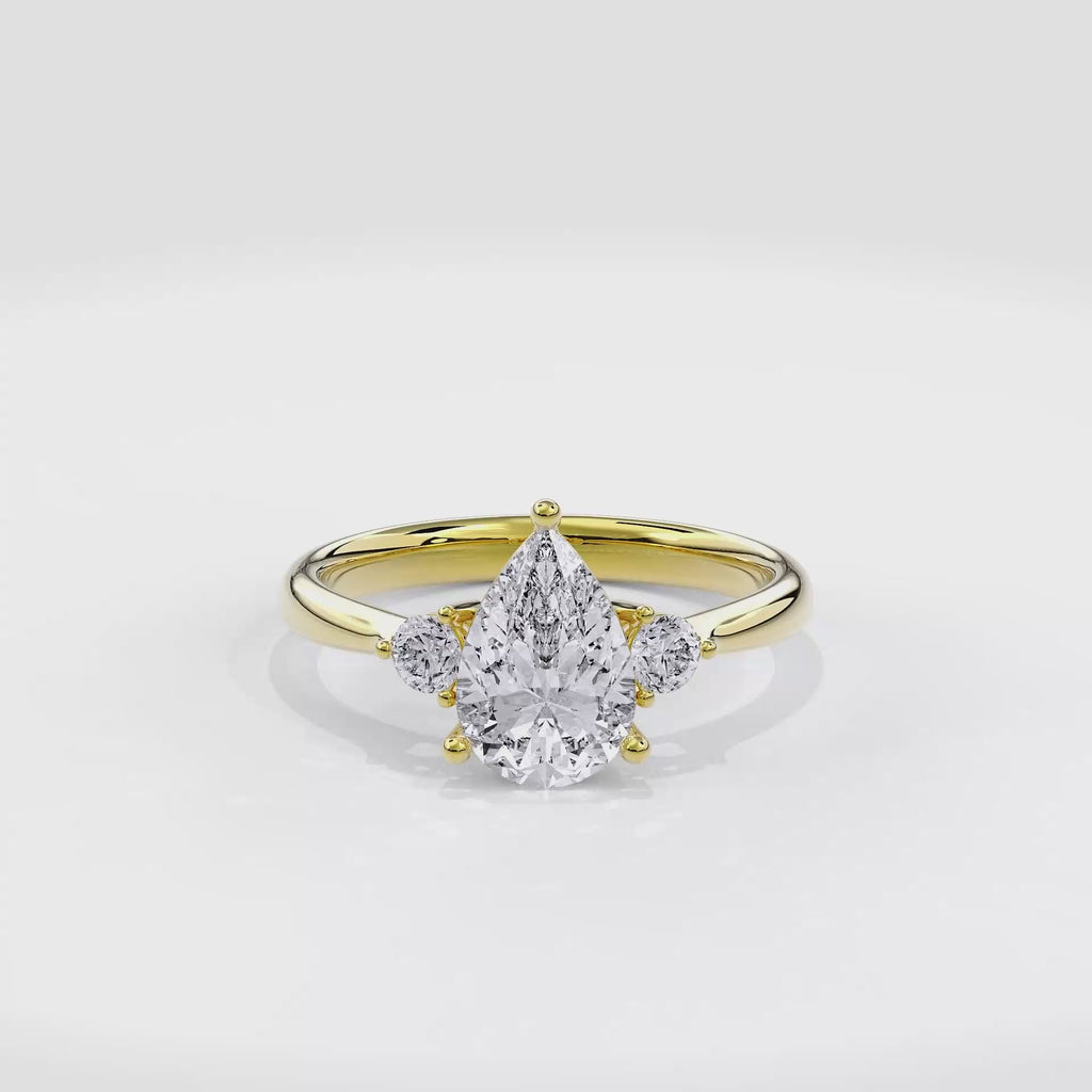 Daphnis Three Stones Engagement Ring Pear•Yellow Gold