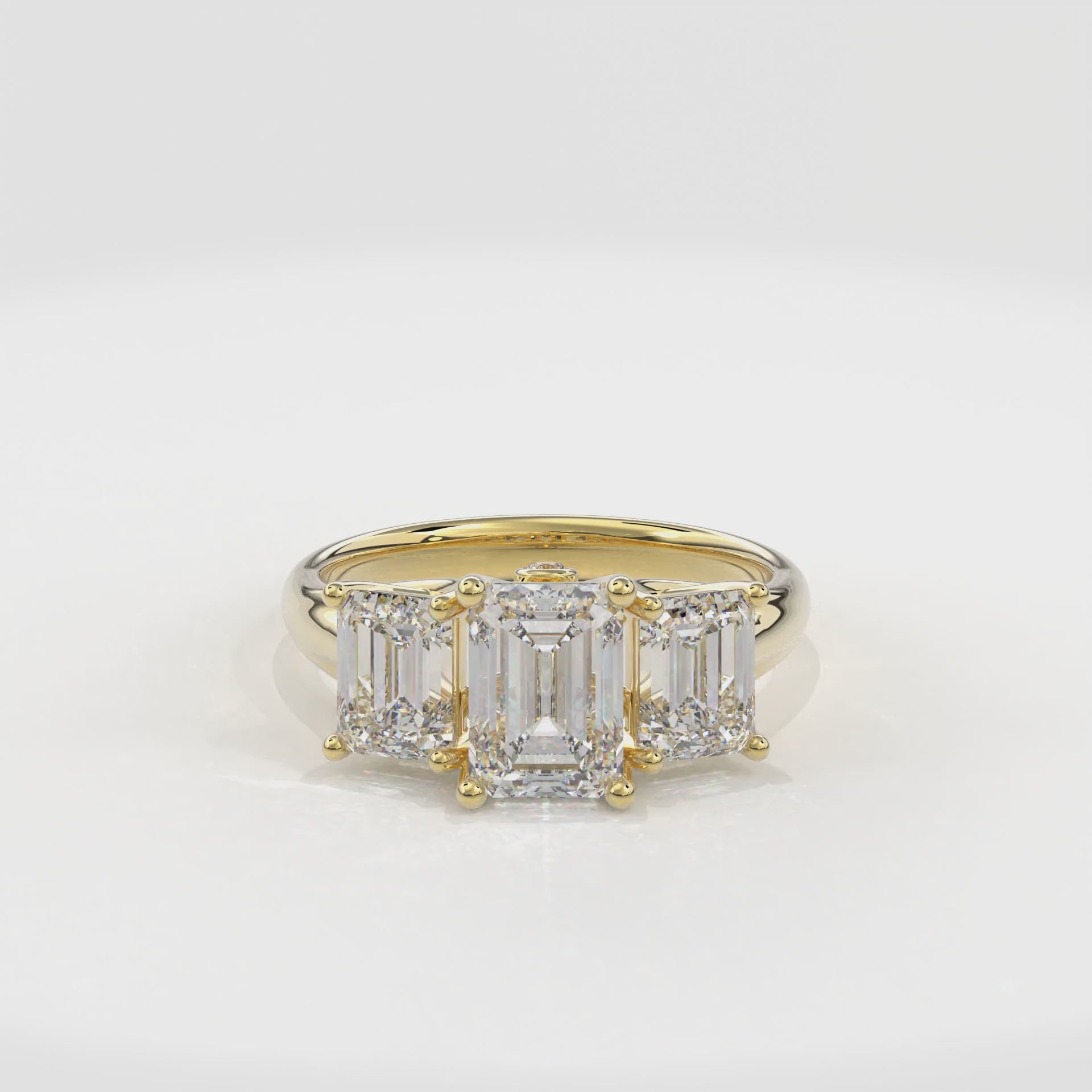 Daphnis Trinity Engagement Ring Emerald•Yellow Gold