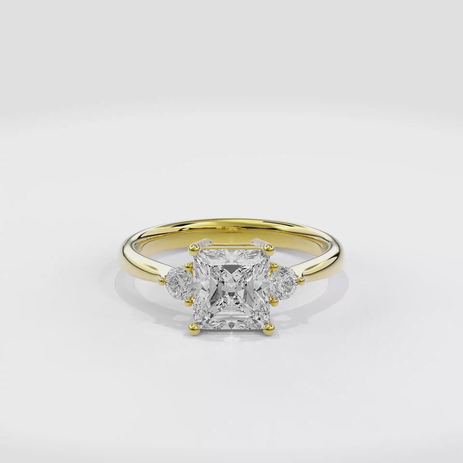 Daphnis Three Stones Engagement Ring Radiant•Yellow Gold