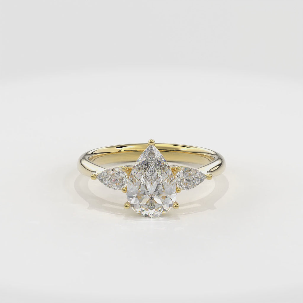 Daphnis Three Stones Engagement Ring Pear•Yellow Gold