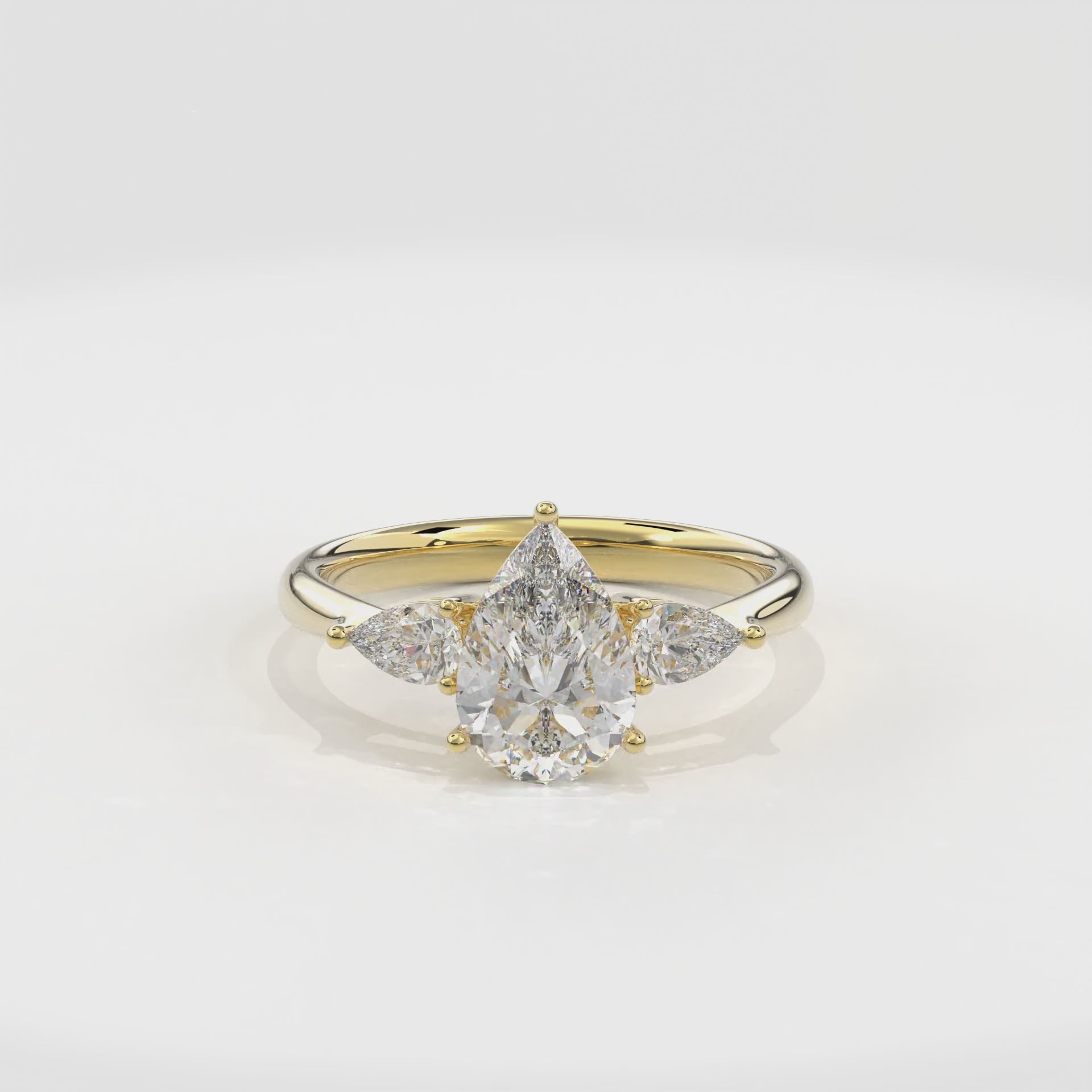 Daphnis Three Stones Engagement Ring Pear•Yellow Gold